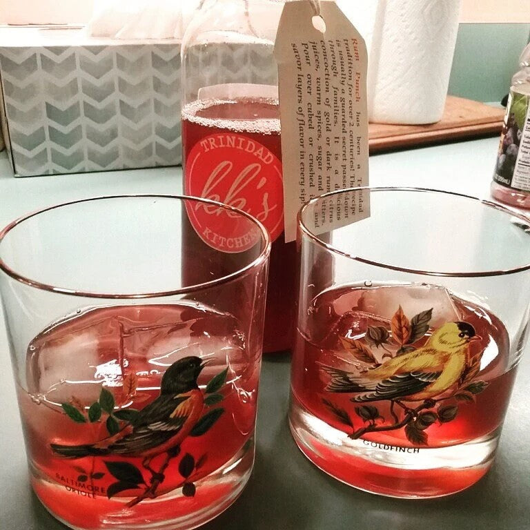 KK's Trinidad Kitchen Rum Punch served in decorative bird glasses